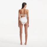 Marilla White Bandeau Satin Swimsuit | Moeva | Swimsuit | Each week unveils new pieces—luxury swimwear, fluid resort silhouettes, and elevated summer-to-evening essentials designed to carry you from coastal escapes to city nights.