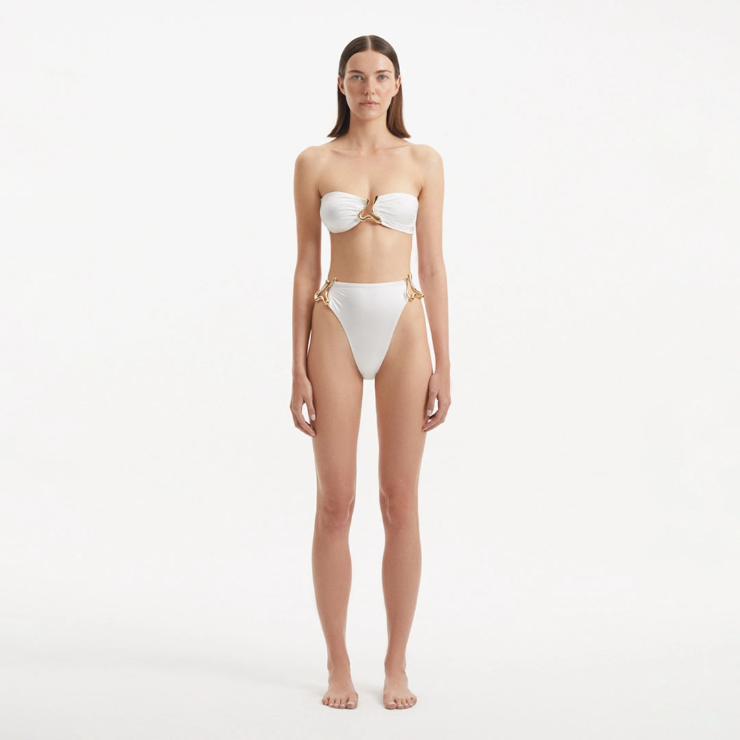 Clyde White Bandeau High Waist Satin Bikini Set | Moeva | Bikini Sets | Each week unveils new pieces—luxury swimwear, fluid resort silhouettes, and elevated summer-to-evening essentials designed to carry you from coastal escapes to city nights.
