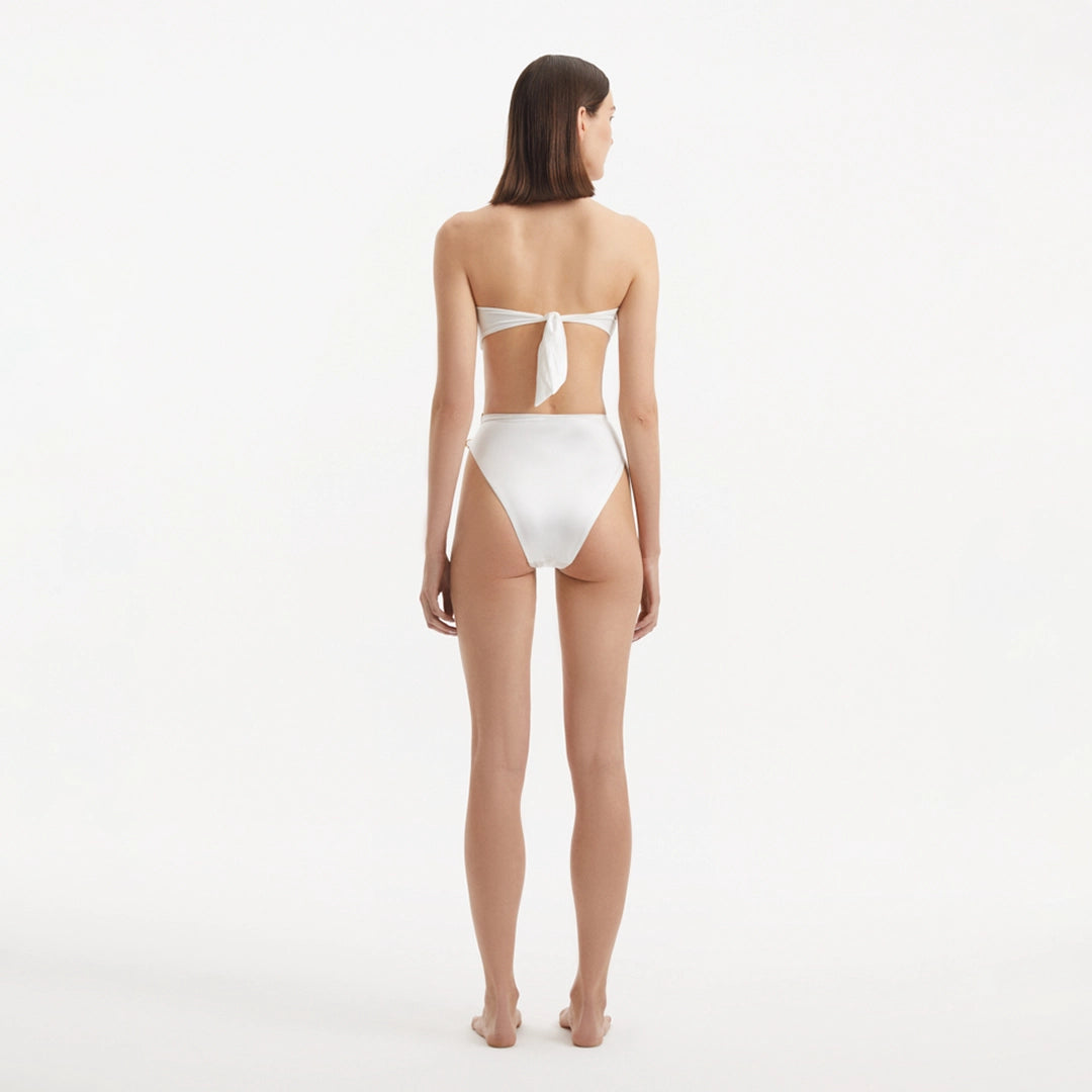 Clyde White Bandeau High Waist Satin Bikini Set | Moeva | Bikini Set | Each week unveils new pieces—luxury swimwear, fluid resort silhouettes, and elevated summer-to-evening essentials designed to carry you from coastal escapes to city nights.