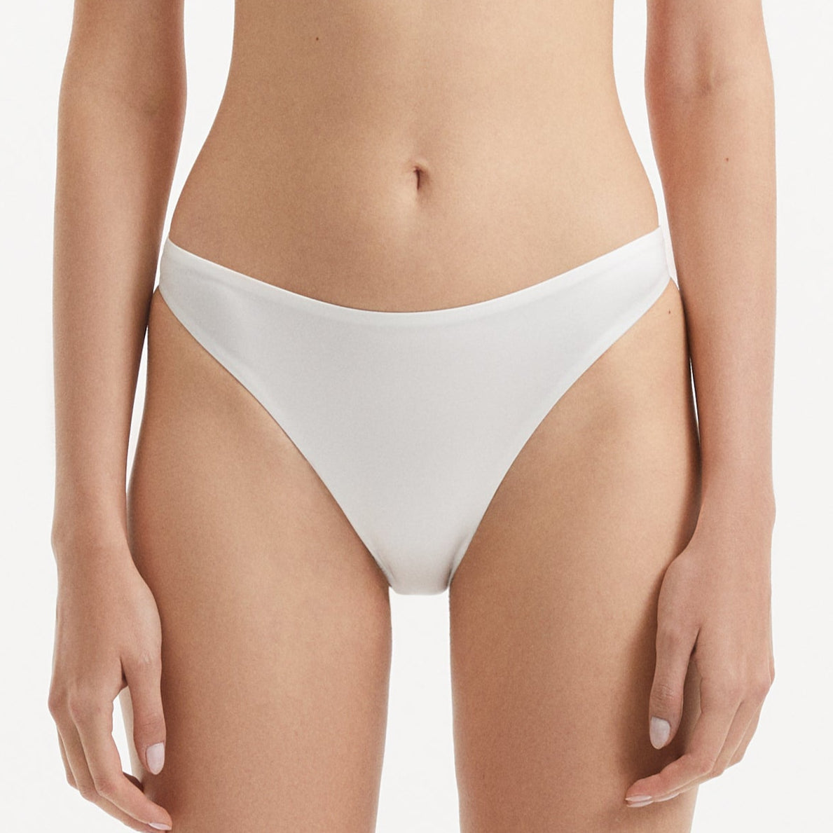 Sereia White Mid Coverage Bikini Bottom | Moeva | Bikini Bottom | Each week unveils new pieces—luxury swimwear, fluid resort silhouettes, and elevated summer-to-evening essentials designed to carry you from coastal escapes to city nights.