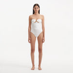 Kenna White Bandeau Satin Swimsuit | Moeva | Swimsuit | Each week unveils new pieces—luxury swimwear, fluid resort silhouettes, and elevated summer-to-evening essentials designed to carry you from coastal escapes to city nights.