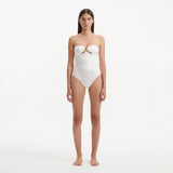 Kenna White Bandeau Satin Swimsuit | Moeva | Swimsuit | Each week unveils new pieces—luxury swimwear, fluid resort silhouettes, and elevated summer-to-evening essentials designed to carry you from coastal escapes to city nights.