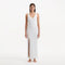 Raine White Knit Maxi Dress with Side Slit & Button Detail | Moeva | RTW Dresses | Each week unveils new pieces—luxury swimwear, fluid resort silhouettes, and elevated summer-to-evening essentials designed to carry you from coastal escapes to city nights.