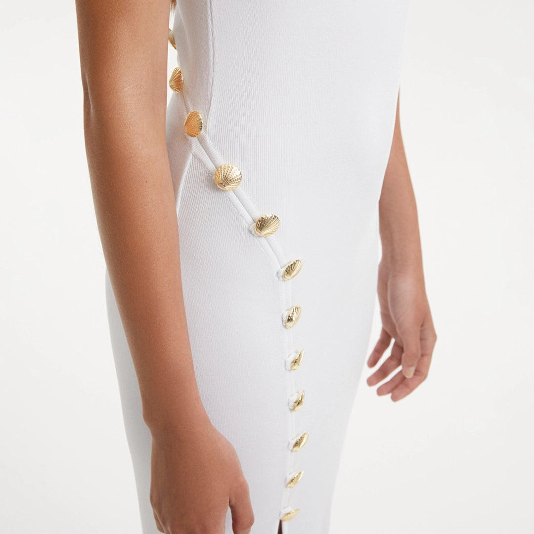 Raine White Knit Maxi Dress with Side Slit & Button Detail | Moeva | RTW Dresses | Each week unveils new pieces—luxury swimwear, fluid resort silhouettes, and elevated summer-to-evening essentials designed to carry you from coastal escapes to city nights.