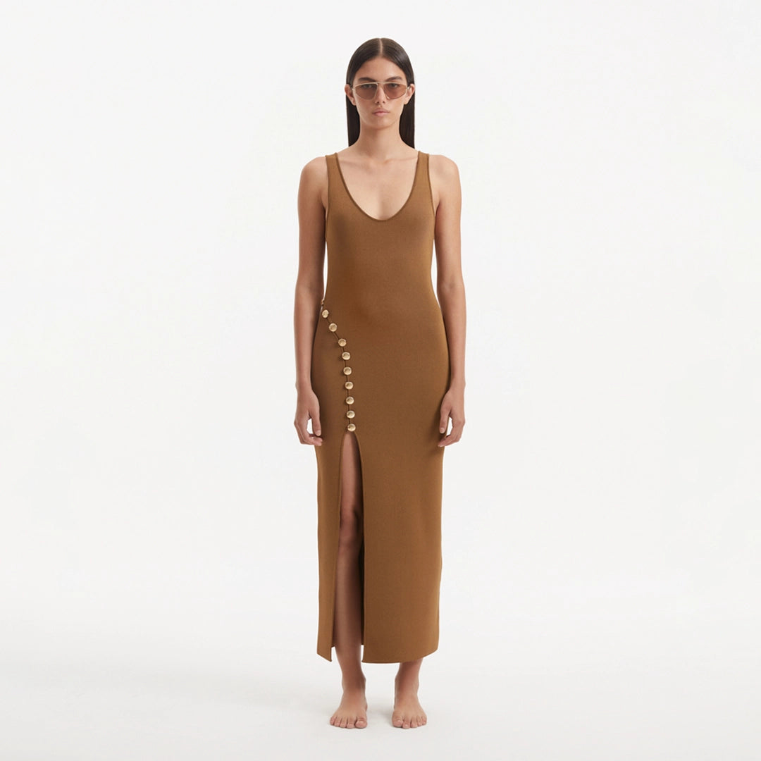 Raine Brown Knit Maxi Dress with Side Slit & Button Detail | Moeva | RTW Dresses | Each week unveils new pieces—luxury swimwear, fluid resort silhouettes, and elevated summer-to-evening essentials designed to carry you from coastal escapes to city nights.