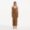 Raine Brown Knit Maxi Dress with Side Slit & Button Detail | Moeva | RTW Dresses | Each week unveils new pieces—luxury swimwear, fluid resort silhouettes, and elevated summer-to-evening essentials designed to carry you from coastal escapes to city nights.