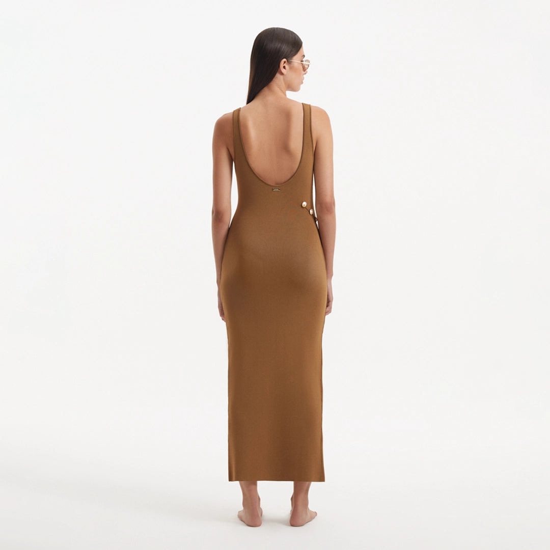 Raine Brown Knit Maxi Dress with Side Slit & Button Detail | Moeva | RTW Dresses | Each week unveils new pieces—luxury swimwear, fluid resort silhouettes, and elevated summer-to-evening essentials designed to carry you from coastal escapes to city nights.