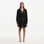Nayeli Black Tie-Front Cotton Shirt Dress | Moeva | Beachwear Dresses | Each week unveils new pieces—luxury swimwear, fluid resort silhouettes, and elevated summer-to-evening essentials designed to carry you from coastal escapes to city nights.