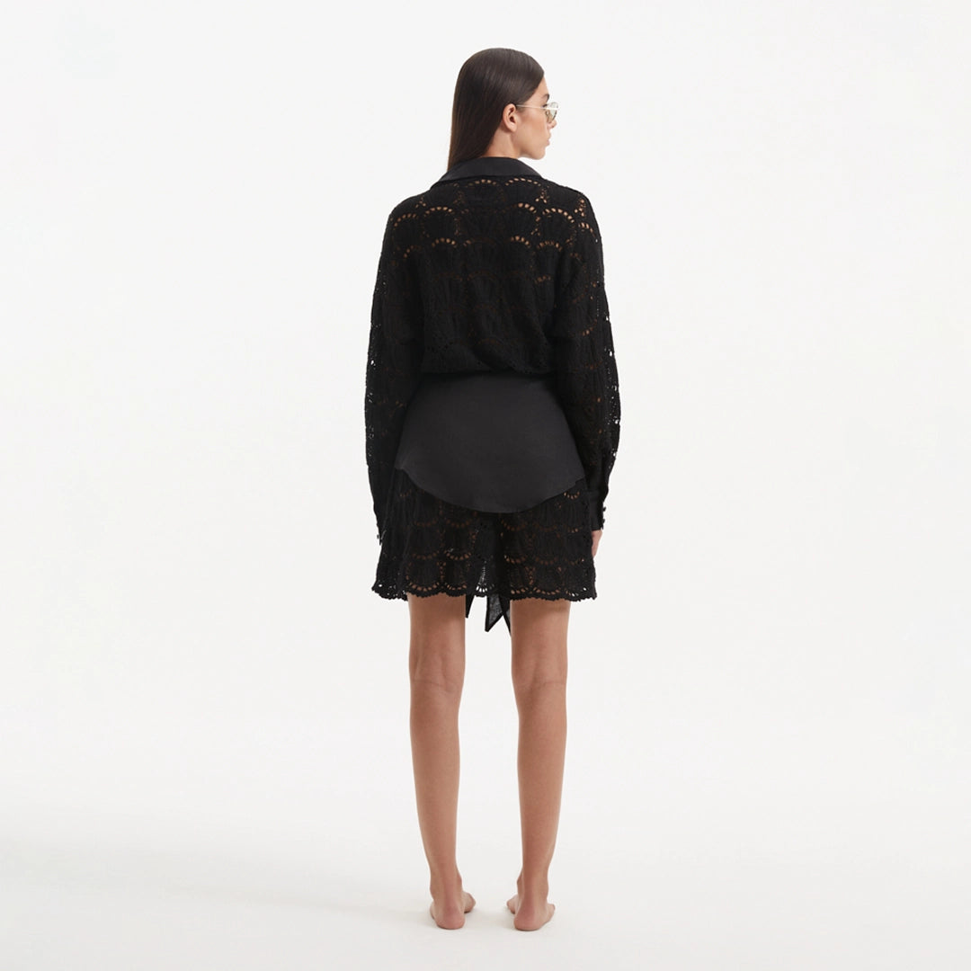 Nayeli Black Tie-Front Cotton Shirt Dress | Moeva | Beachwear Dresses | Each week unveils new pieces—luxury swimwear, fluid resort silhouettes, and elevated summer-to-evening essentials designed to carry you from coastal escapes to city nights.
