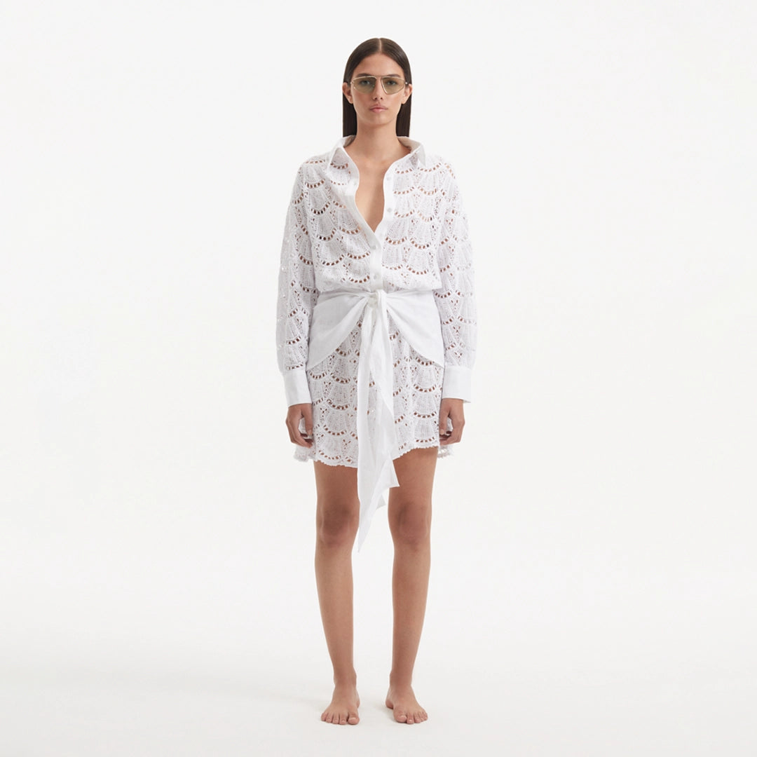 Nayeli White Tie-Front Cotton Shirt Dress | Moeva | Beachwear Dresses | Each week unveils new pieces—luxury swimwear, fluid resort silhouettes, and elevated summer-to-evening essentials designed to carry you from coastal escapes to city nights.