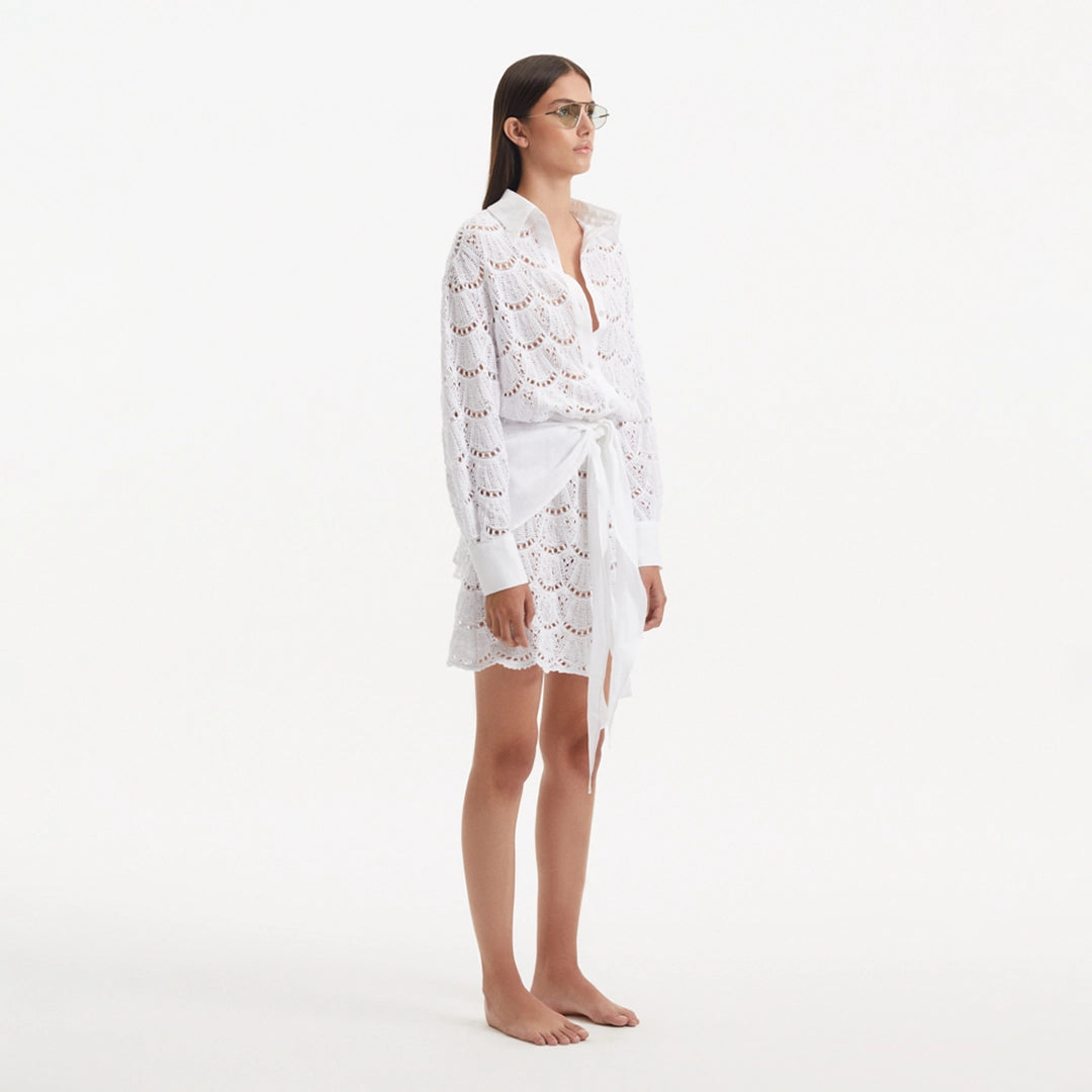 Nayeli White Tie-Front Cotton Shirt Dress | Moeva | Beachwear Dresses | Each week unveils new pieces—luxury swimwear, fluid resort silhouettes, and elevated summer-to-evening essentials designed to carry you from coastal escapes to city nights.