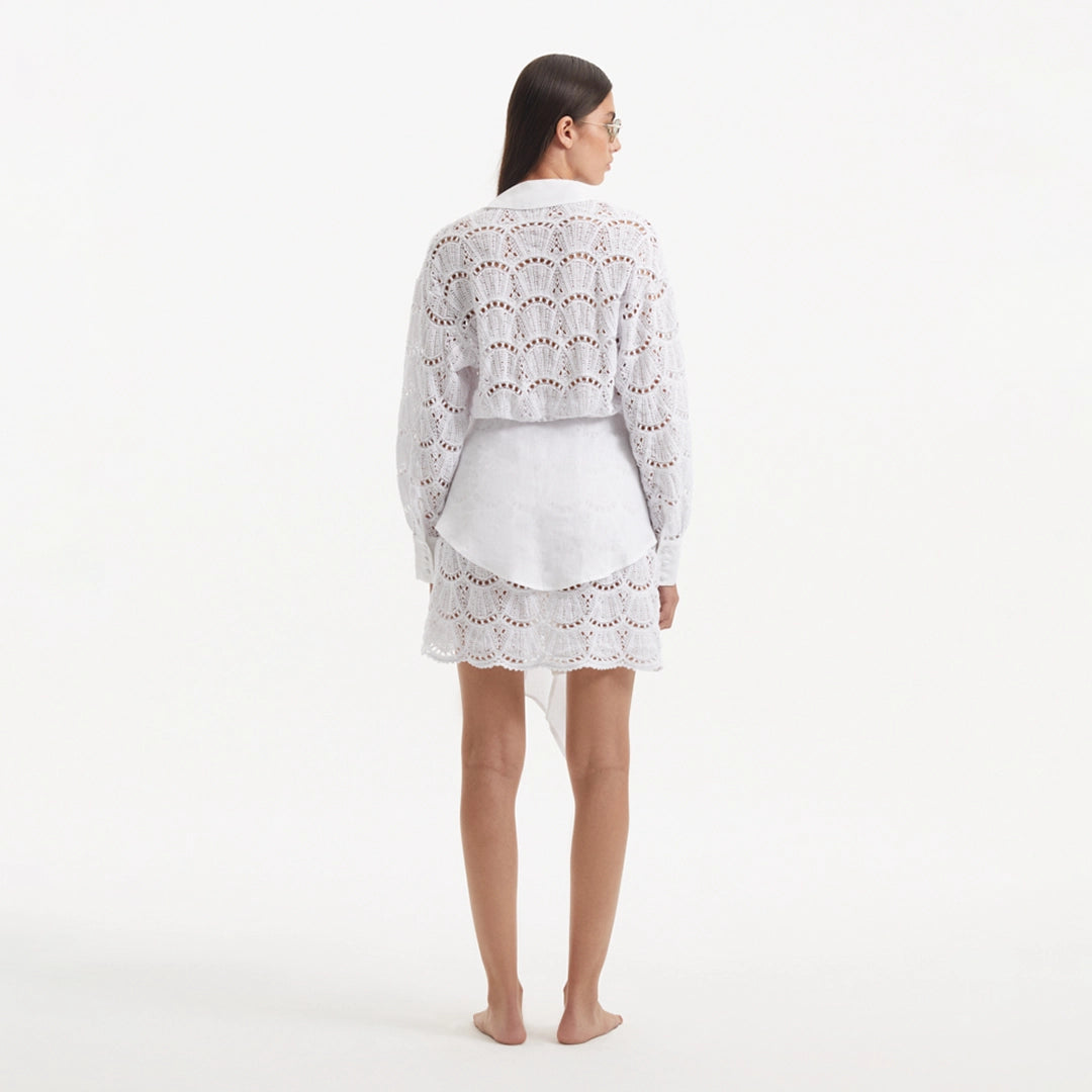 Nayeli White Tie-Front Cotton Shirt Dress | Moeva | Beachwear Dresses | Each week unveils new pieces—luxury swimwear, fluid resort silhouettes, and elevated summer-to-evening essentials designed to carry you from coastal escapes to city nights.