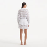 Nayeli White Tie-Front Cotton Shirt Dress | Moeva | Beachwear Dresses | Each week unveils new pieces—luxury swimwear, fluid resort silhouettes, and elevated summer-to-evening essentials designed to carry you from coastal escapes to city nights.