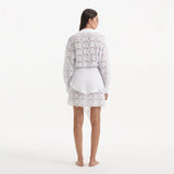 Nayeli White Tie-Front Cotton Shirt Dress | Moeva | Beachwear Dresses | Each week unveils new pieces—luxury swimwear, fluid resort silhouettes, and elevated summer-to-evening essentials designed to carry you from coastal escapes to city nights.