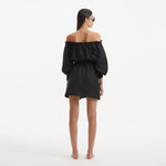 Sumner Black Off-Shoulder Linen Mini Dress | Moeva | Dress | Each week unveils new pieces—luxury swimwear, fluid resort silhouettes, and elevated summer-to-evening essentials designed to carry you from coastal escapes to city nights.