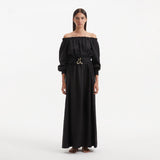 Sumner Black Off-Shoulder Linen Mini Dress | Moeva | RTW Dresses | Each week unveils new pieces—luxury swimwear, fluid resort silhouettes, and elevated summer-to-evening essentials designed to carry you from coastal escapes to city nights.