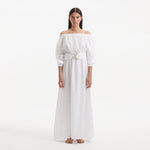 Dante White Off-Shoulder Maxi Dress with Belted Waist | Moeva | RTW Dresses | Each week unveils new pieces—luxury swimwear, fluid resort silhouettes, and elevated summer-to-evening essentials designed to carry you from coastal escapes to city nights.