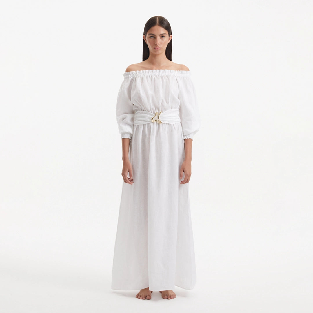Dante White Off-Shoulder Maxi Dress with Belted Waist | Moeva | RTW Dresses | Each week unveils new pieces—luxury swimwear, fluid resort silhouettes, and elevated summer-to-evening essentials designed to carry you from coastal escapes to city nights.