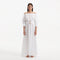 Dante White Off-Shoulder Maxi Dress with Belted Waist | Moeva | RTW Dresses | Each week unveils new pieces—luxury swimwear, fluid resort silhouettes, and elevated summer-to-evening essentials designed to carry you from coastal escapes to city nights.