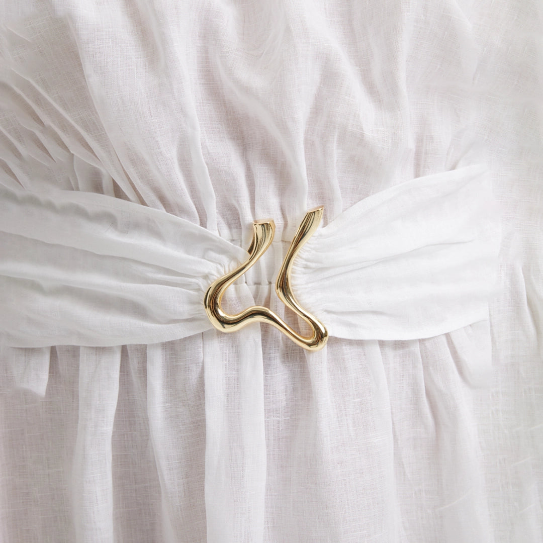 Dante White Off-Shoulder Maxi Dress with Belted Waist | Moeva | RTW Dresses | Each week unveils new pieces—luxury swimwear, fluid resort silhouettes, and elevated summer-to-evening essentials designed to carry you from coastal escapes to city nights.