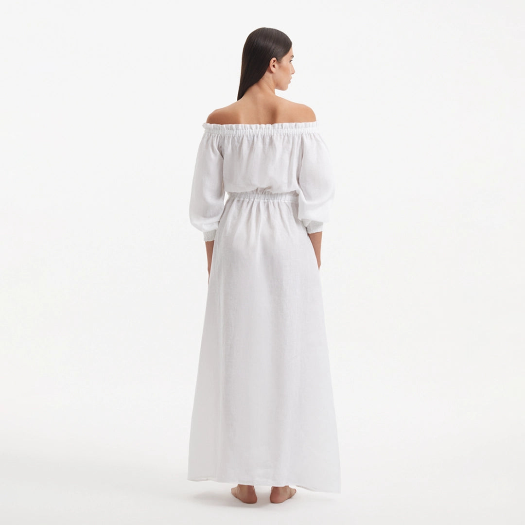Dante White Off-Shoulder Maxi Dress with Belted Waist | Moeva | RTW Dresses | Each week unveils new pieces—luxury swimwear, fluid resort silhouettes, and elevated summer-to-evening essentials designed to carry you from coastal escapes to city nights.