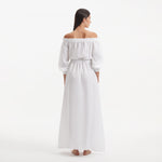 Dante White Off-Shoulder Maxi Dress with Belted Waist | Moeva | RTW Dresses | Each week unveils new pieces—luxury swimwear, fluid resort silhouettes, and elevated summer-to-evening essentials designed to carry you from coastal escapes to city nights.