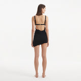 Ephram Black Wave-Textured Mini Skirt Skirt | Moeva | Beachwear Skirts | Each week unveils new pieces—luxury swimwear, fluid resort silhouettes, and elevated summer-to-evening essentials designed to carry you from coastal escapes to city nights.