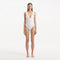 Breena White V Neck Swimsuit | Moeva | Swimsuit | Each week unveils new pieces—luxury swimwear, fluid resort silhouettes, and elevated summer-to-evening essentials designed to carry you from coastal escapes to city nights.