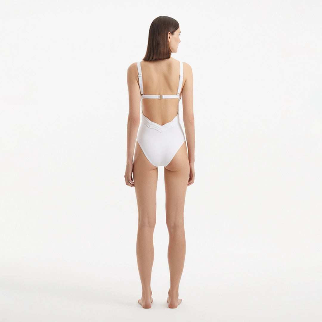 Breena White V Neck Swimsuit | Moeva | Swimsuit | Each week unveils new pieces—luxury swimwear, fluid resort silhouettes, and elevated summer-to-evening essentials designed to carry you from coastal escapes to city nights.