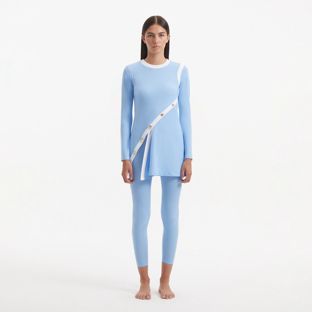 Kamaria Blue Long Sleeve Accessorised Modest Swim Set | Moeva | Swimsuit | Each week unveils new pieces—luxury swimwear, fluid resort silhouettes, and elevated summer-to-evening essentials designed to carry you from coastal escapes to city nights.