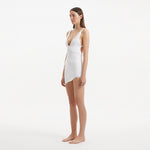Ephram White Wave-Textured Mini Skirt Skirt | Moeva | Beachwear Skirts | Each week unveils new pieces—luxury swimwear, fluid resort silhouettes, and elevated summer-to-evening essentials designed to carry you from coastal escapes to city nights.