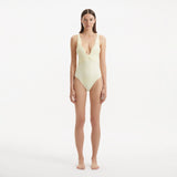 Breena Yellow V Neck Swimsuit | Moeva | Swimsuit | Each week unveils new pieces—luxury swimwear, fluid resort silhouettes, and elevated summer-to-evening essentials designed to carry you from coastal escapes to city nights.
