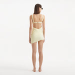 Ephram Yellow Wave-Textured Mini Skirt | Moeva | Beachwear Skirts | Each week unveils new pieces—luxury swimwear, fluid resort silhouettes, and elevated summer-to-evening essentials designed to carry you from coastal escapes to city nights.