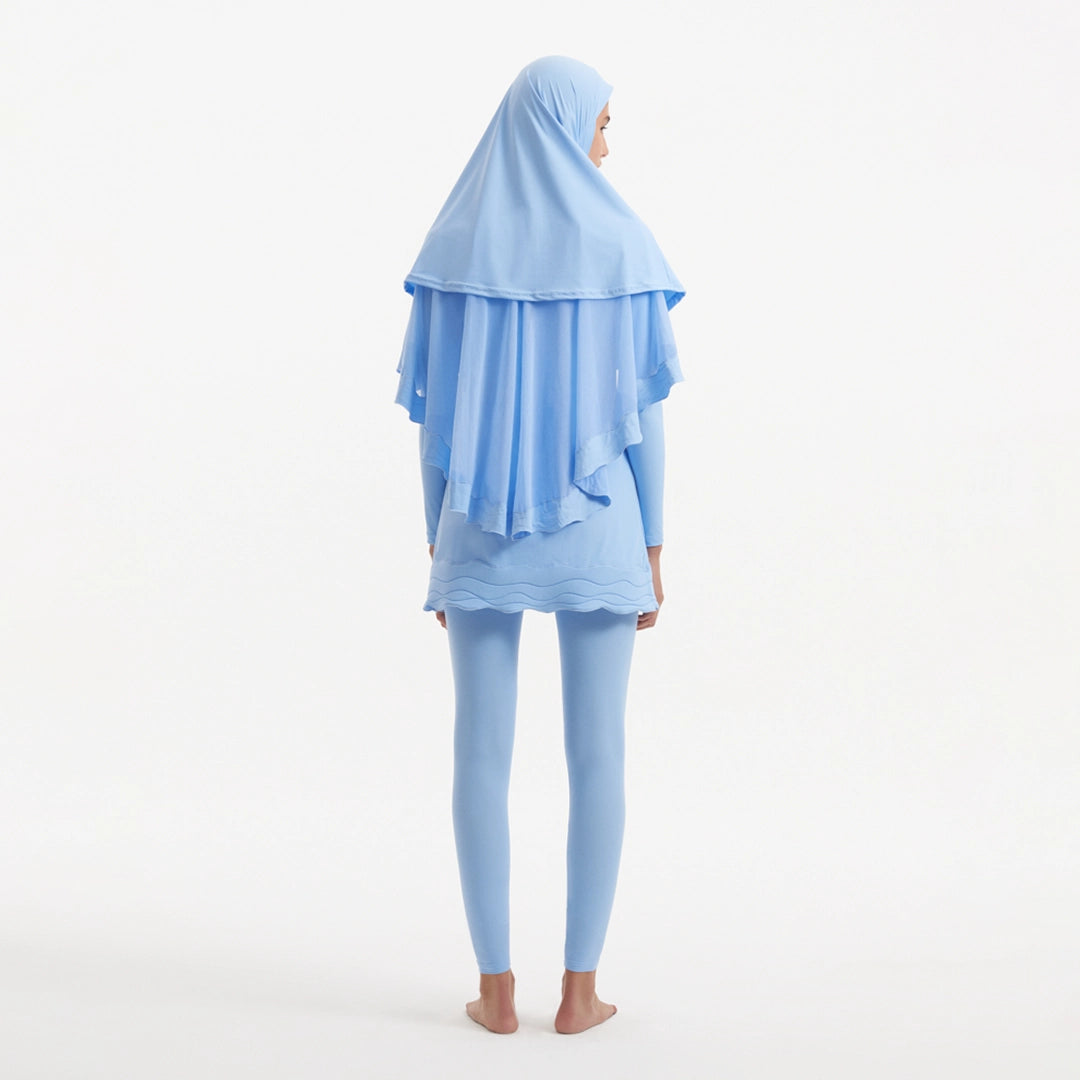 Risha Baby Blue Swim Hijab | Moeva | | Each week unveils new pieces—luxury swimwear, fluid resort silhouettes, and elevated summer-to-evening essentials designed to carry you from coastal escapes to city nights.