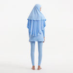 Risha Baby Blue Swim Hijab | Moeva | | Each week unveils new pieces—luxury swimwear, fluid resort silhouettes, and elevated summer-to-evening essentials designed to carry you from coastal escapes to city nights.