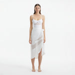 Pelagia White Tie Front Wavy-Trim Sheer Sarong | Moeva | Sarongs | Each week unveils new pieces—luxury swimwear, fluid resort silhouettes, and elevated summer-to-evening essentials designed to carry you from coastal escapes to city nights.
