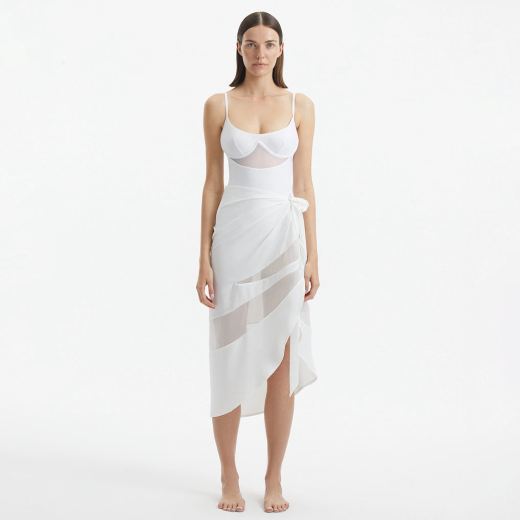 Pelagia White Tie Front Wavy-Trim Sheer Sarong | Moeva | Sarong | Each week unveils new pieces—luxury swimwear, fluid resort silhouettes, and elevated summer-to-evening essentials designed to carry you from coastal escapes to city nights.