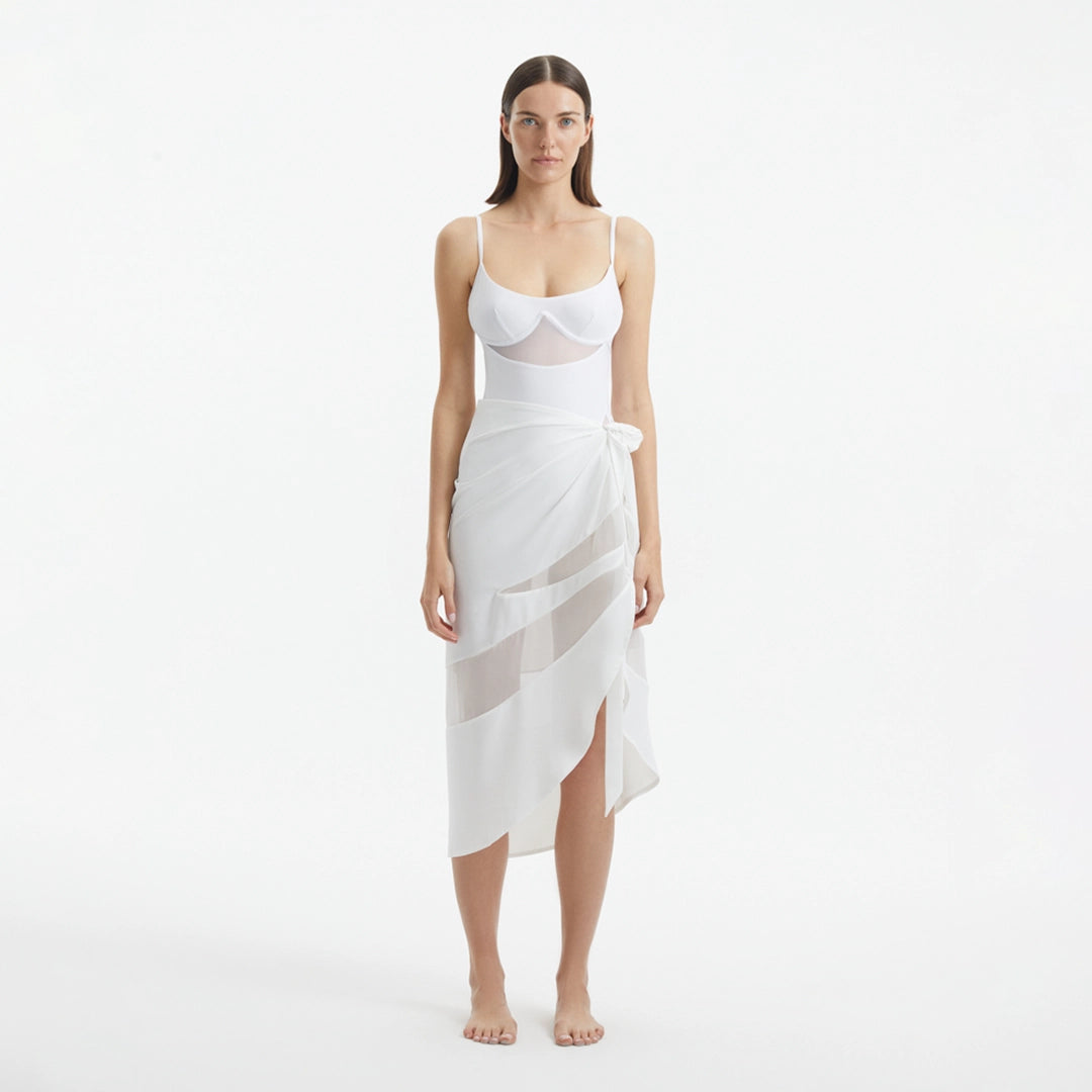 Pelagia White Tie Front Wavy-Trim Sheer Sarong | Moeva | Sarongs | Each week unveils new pieces—luxury swimwear, fluid resort silhouettes, and elevated summer-to-evening essentials designed to carry you from coastal escapes to city nights.