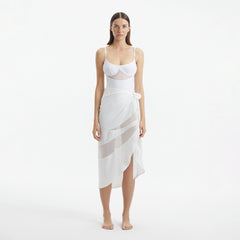 Pelagia White Tie Front Wavy-Trim Sheer Sarong | Moeva | Sarongs | Each week unveils new pieces—luxury swimwear, fluid resort silhouettes, and elevated summer-to-evening essentials designed to carry you from coastal escapes to city nights.