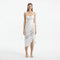 Pelagia White Tie Front Wavy-Trim Sheer Sarong | Moeva | Sarongs | Each week unveils new pieces—luxury swimwear, fluid resort silhouettes, and elevated summer-to-evening essentials designed to carry you from coastal escapes to city nights.