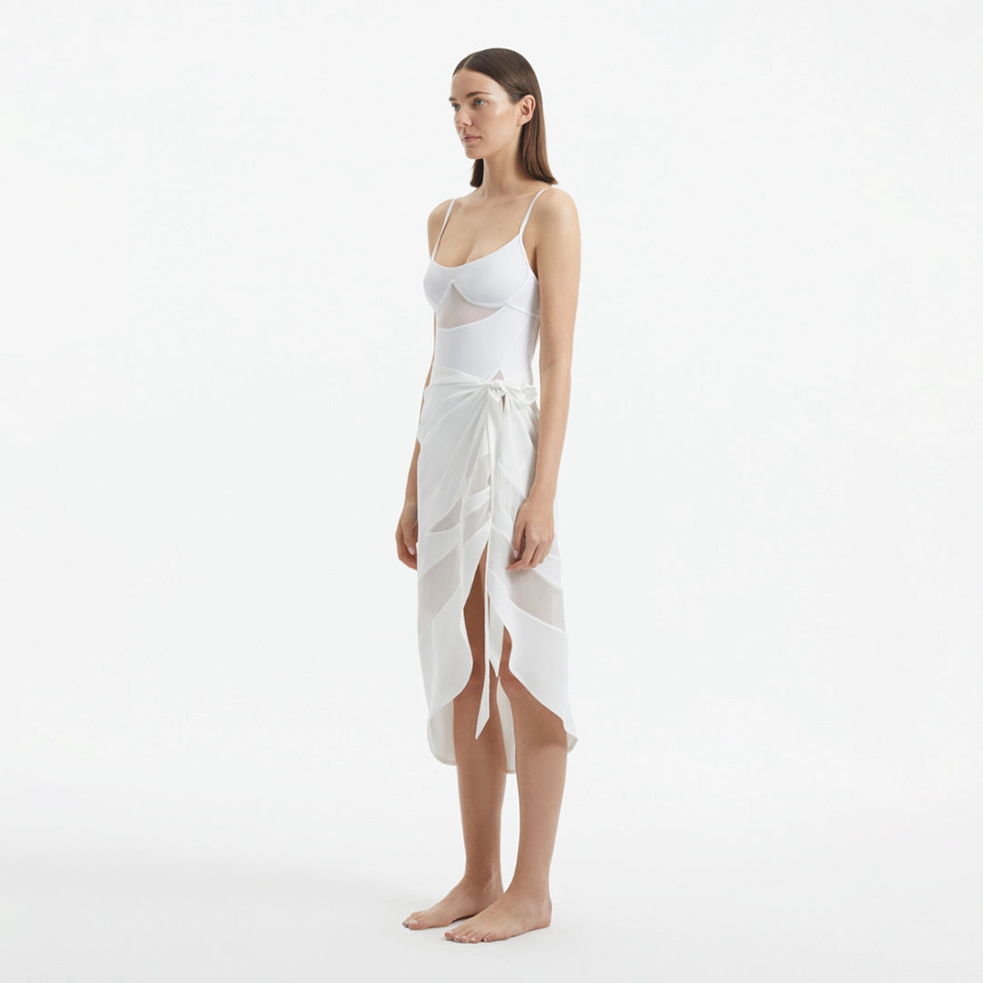 Pelagia White Tie Front Wavy-Trim Sheer Sarong | Moeva | Sarongs | Each week unveils new pieces—luxury swimwear, fluid resort silhouettes, and elevated summer-to-evening essentials designed to carry you from coastal escapes to city nights.