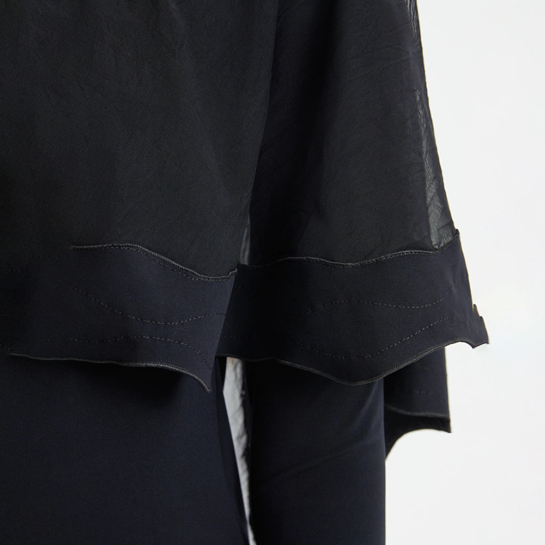 Nasima Black Layered Modest Swim Set | Moeva | Swimsuit | Each week unveils new pieces—luxury swimwear, fluid resort silhouettes, and elevated summer-to-evening essentials designed to carry you from coastal escapes to city nights.