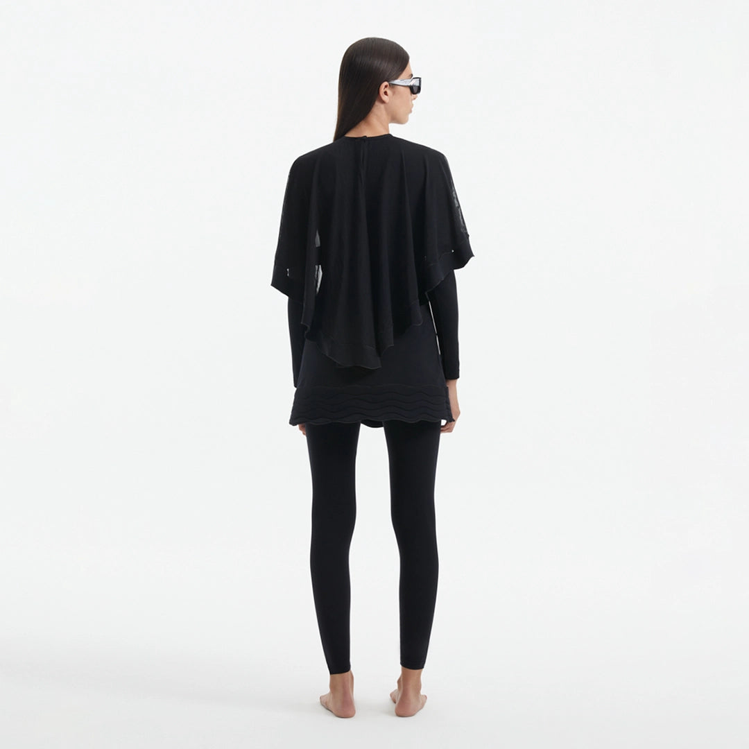 Nasima Black Layered Modest Swim Set | Moeva | Swimsuit | Each week unveils new pieces—luxury swimwear, fluid resort silhouettes, and elevated summer-to-evening essentials designed to carry you from coastal escapes to city nights.