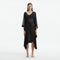 Opal Black Sheer Gold Buttoned Belted Kaftan | Moeva | Kaftan | Each week unveils new pieces—luxury swimwear, fluid resort silhouettes, and elevated summer-to-evening essentials designed to carry you from coastal escapes to city nights.
