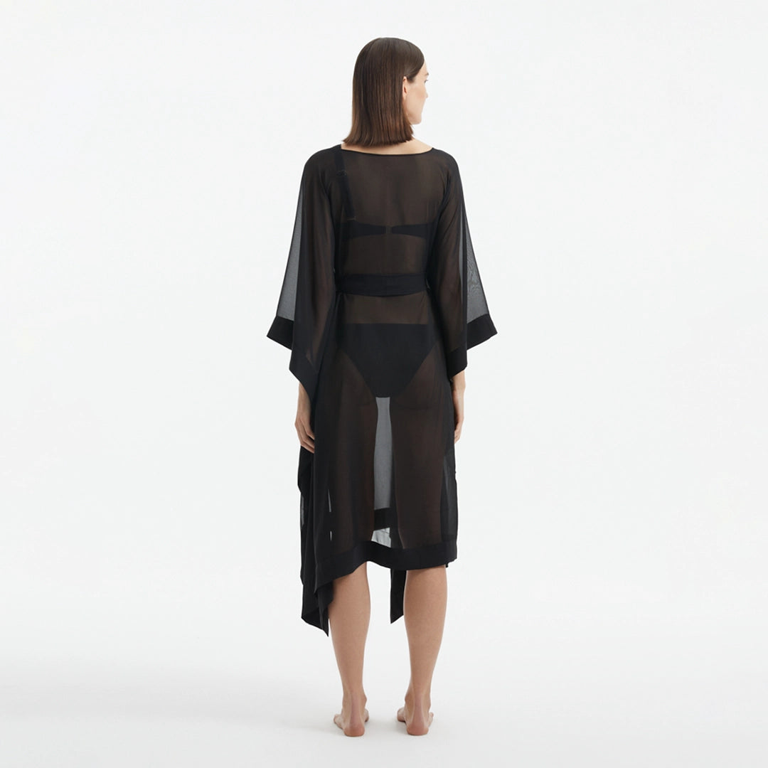 Opal Black Sheer Gold Buttoned Belted Kaftan | Moeva | Kaftan | Each week unveils new pieces—luxury swimwear, fluid resort silhouettes, and elevated summer-to-evening essentials designed to carry you from coastal escapes to city nights.