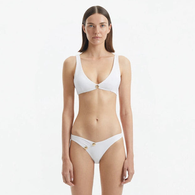 Aeron White V Neck Textured Mid Coverage Bikini Set | Moeva | Bikini Set | Each week unveils new pieces—luxury swimwear, fluid resort silhouettes, and elevated summer-to-evening essentials designed to carry you from coastal escapes to city nights.