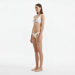 Aeron White V Neck Textured Mid Coverage Bikini Set | Moeva | | Each week unveils new pieces—luxury swimwear, fluid resort silhouettes, and elevated summer-to-evening essentials designed to carry you from coastal escapes to city nights.
