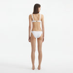 Aeron White V Neck Textured Mid Coverage Bikini Set | Moeva | | Each week unveils new pieces—luxury swimwear, fluid resort silhouettes, and elevated summer-to-evening essentials designed to carry you from coastal escapes to city nights.