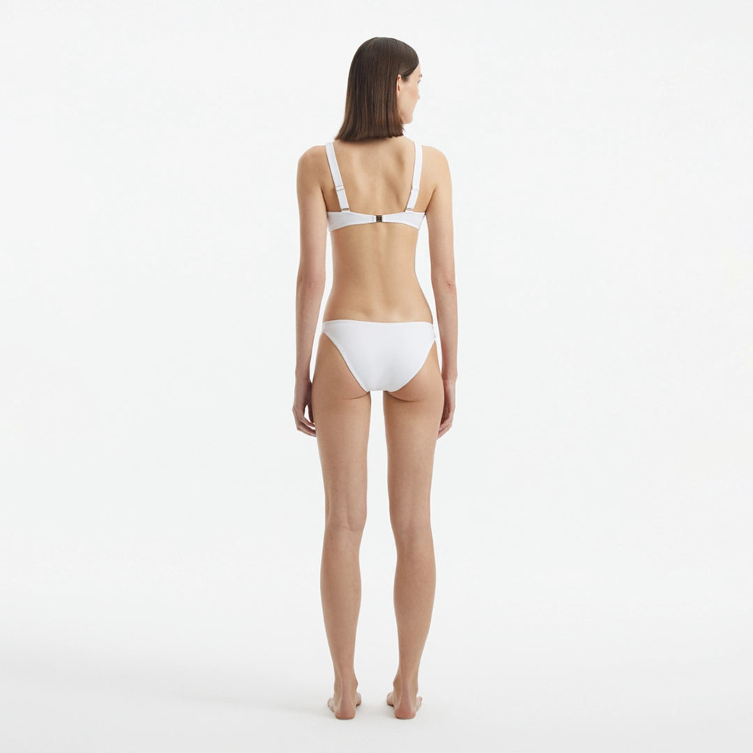 Aeron White V Neck Textured Mid Coverage Bikini Set | Moeva | Bikini Set | Each week unveils new pieces—luxury swimwear, fluid resort silhouettes, and elevated summer-to-evening essentials designed to carry you from coastal escapes to city nights.