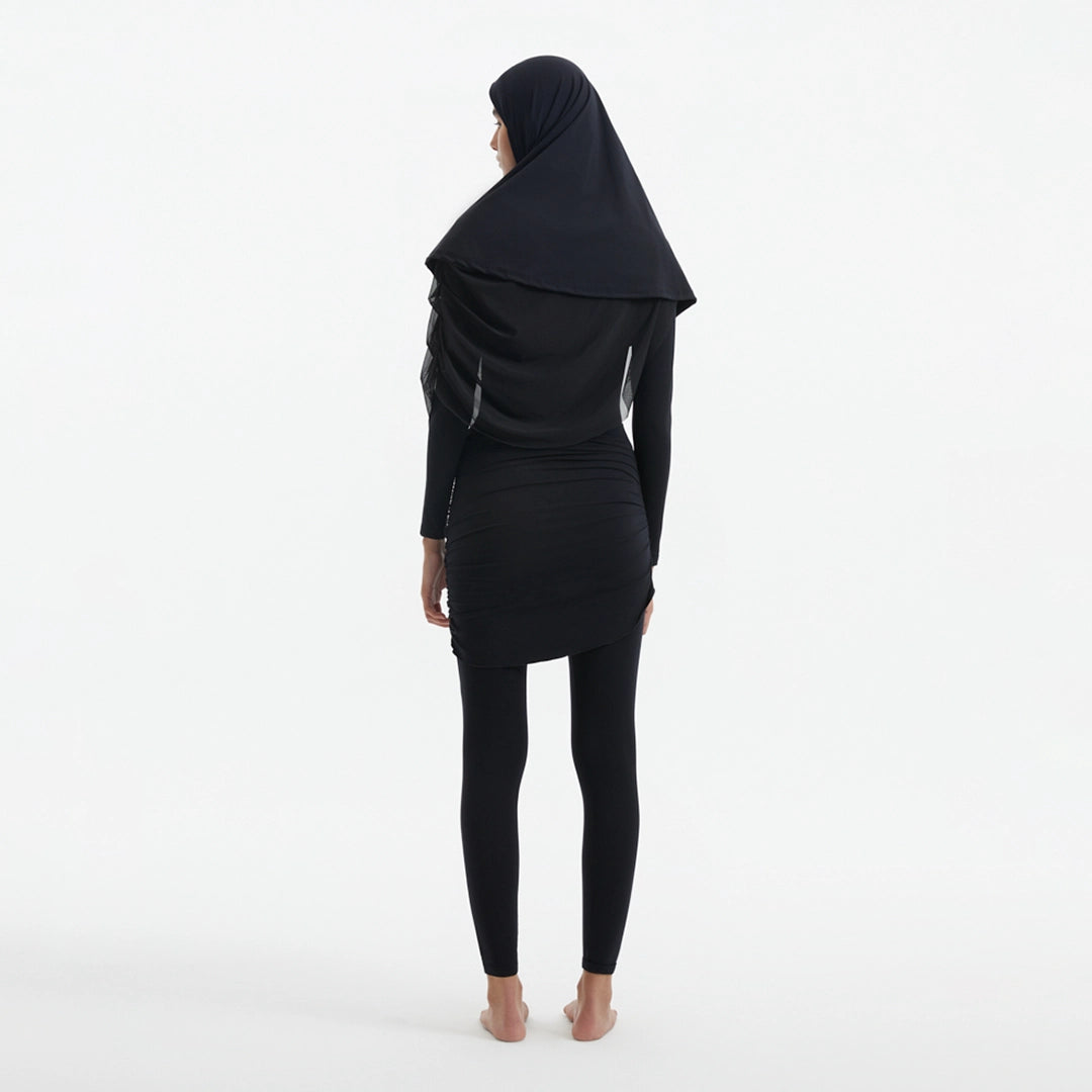 Risha Black Swim Hijab | Moeva | Women Hair Accessories | Each week unveils new pieces—luxury swimwear, fluid resort silhouettes, and elevated summer-to-evening essentials designed to carry you from coastal escapes to city nights.